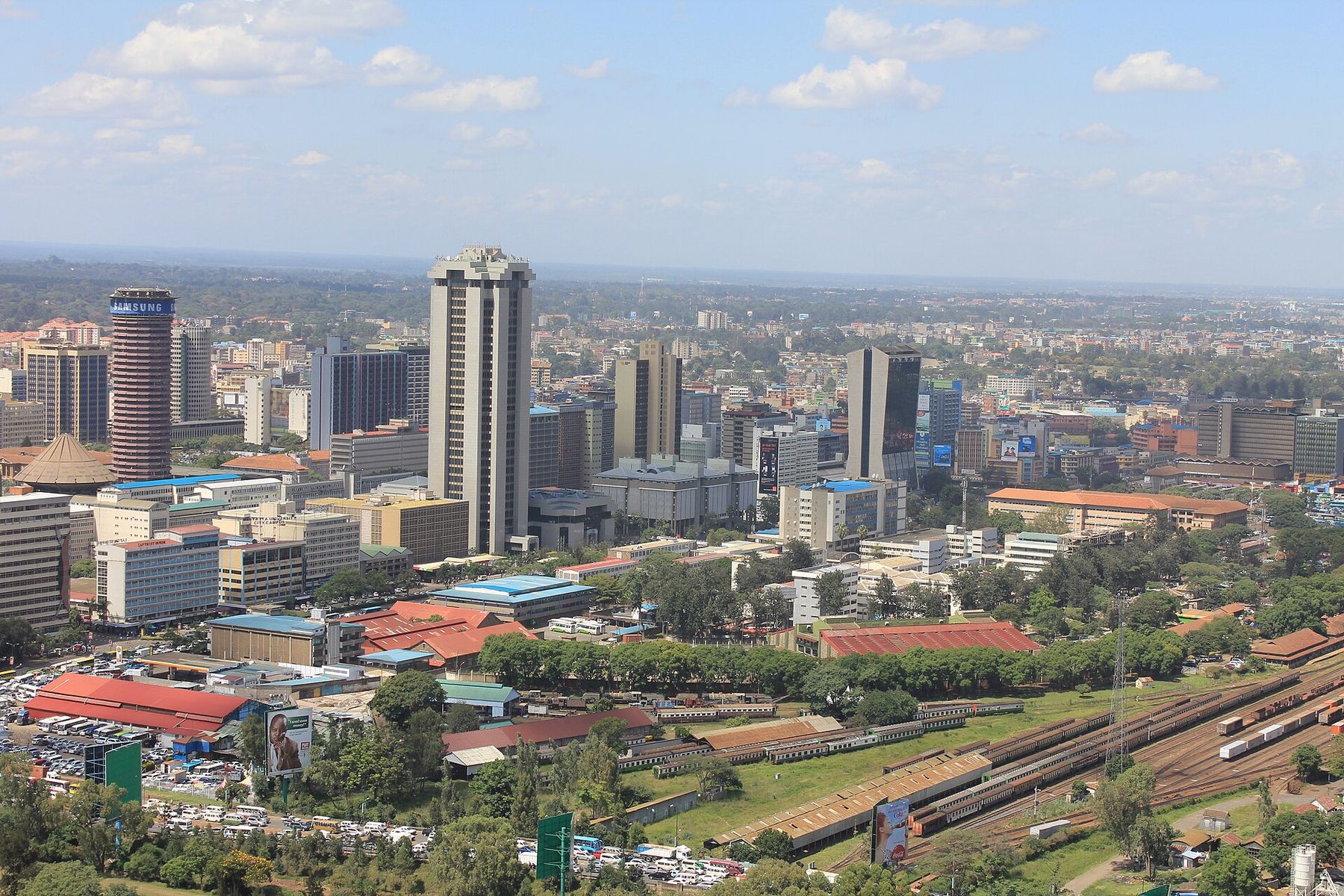 View over Nairobi's Upper Hill and city centre, with office towers and the railway line in the foreground